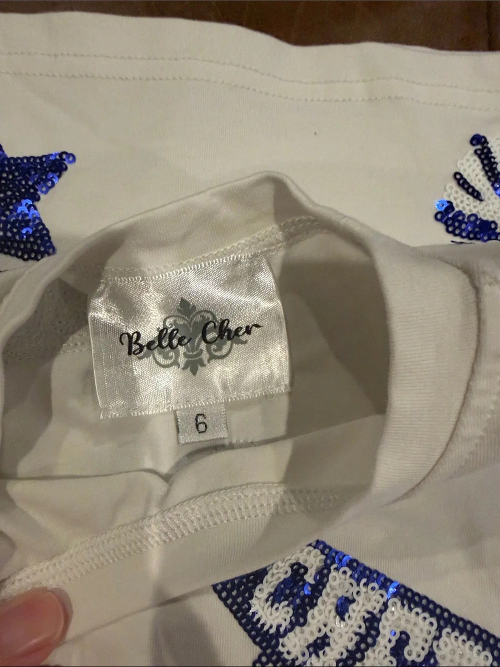 Belle Cher Girl’s White T‑Shirt with Blue Sequin Cheer Motifs